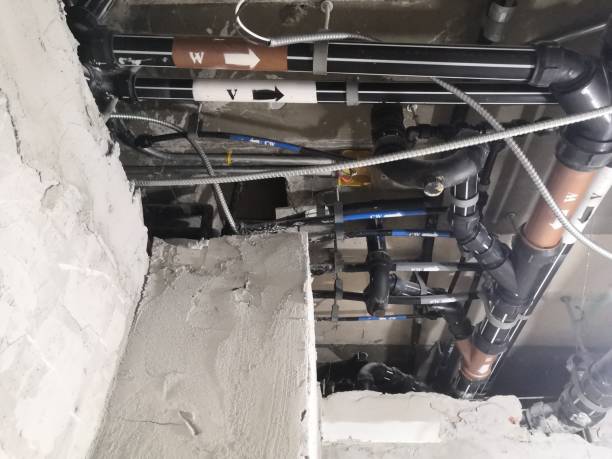 Plumbing pipes above the ceiling .Sanitary System.